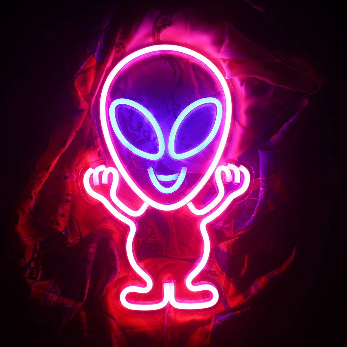logo-ul cu neon strălucește pe perete - extraterestru